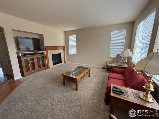 a kitchen with stainless steel appliances granite countertop a sink stove and microwave