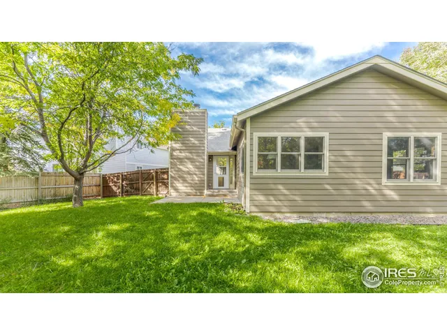 a black and white photo of a house