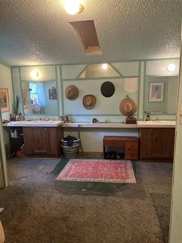 a kitchen with a stove and cabinets