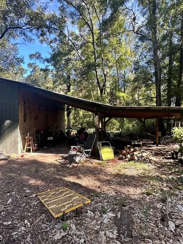 a view of a outdoor space with a patio and sitting area