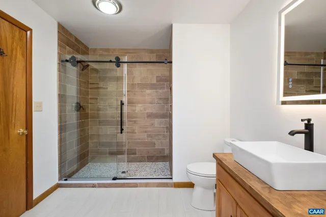 a view of a balcony with chairs