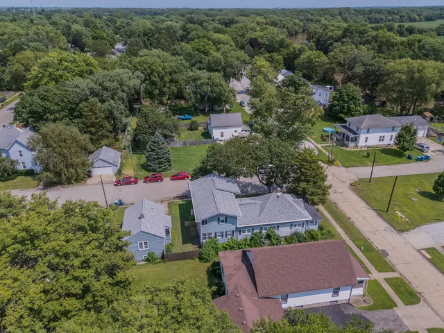 an aerial view of a house with a garden
