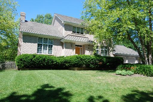 3002 Robinson Road Rockford, IL 61114 - Photo 1 of 13 a front view of a house with a yard
