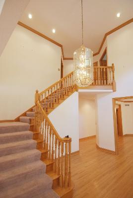 3002 Robinson Road Rockford, IL 61114 - Photo 2 of 13 a view of entryway and hall with wooden floor
