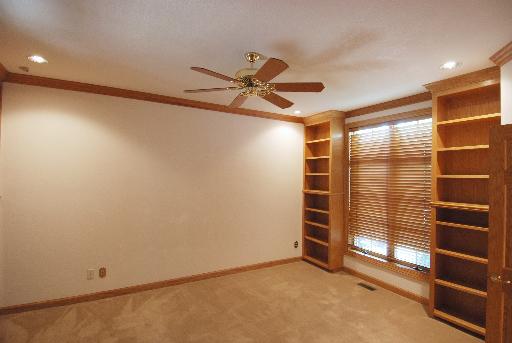 3002 Robinson Road Rockford, IL 61114 - Photo 9 of 13 a view of an empty room with a window