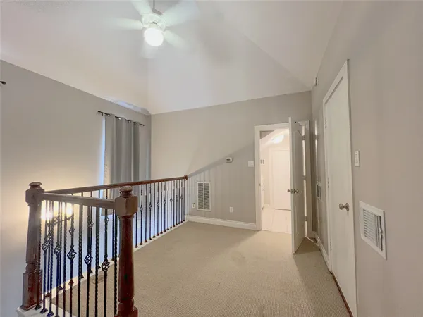 a view of a hallway with entryway