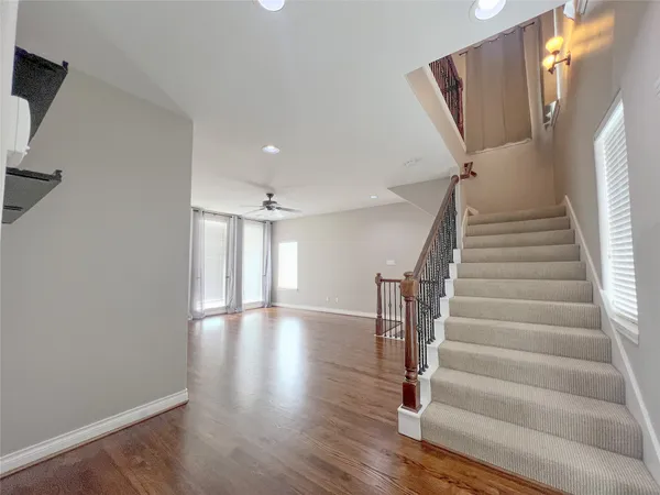 a view of entryway with wooden floor