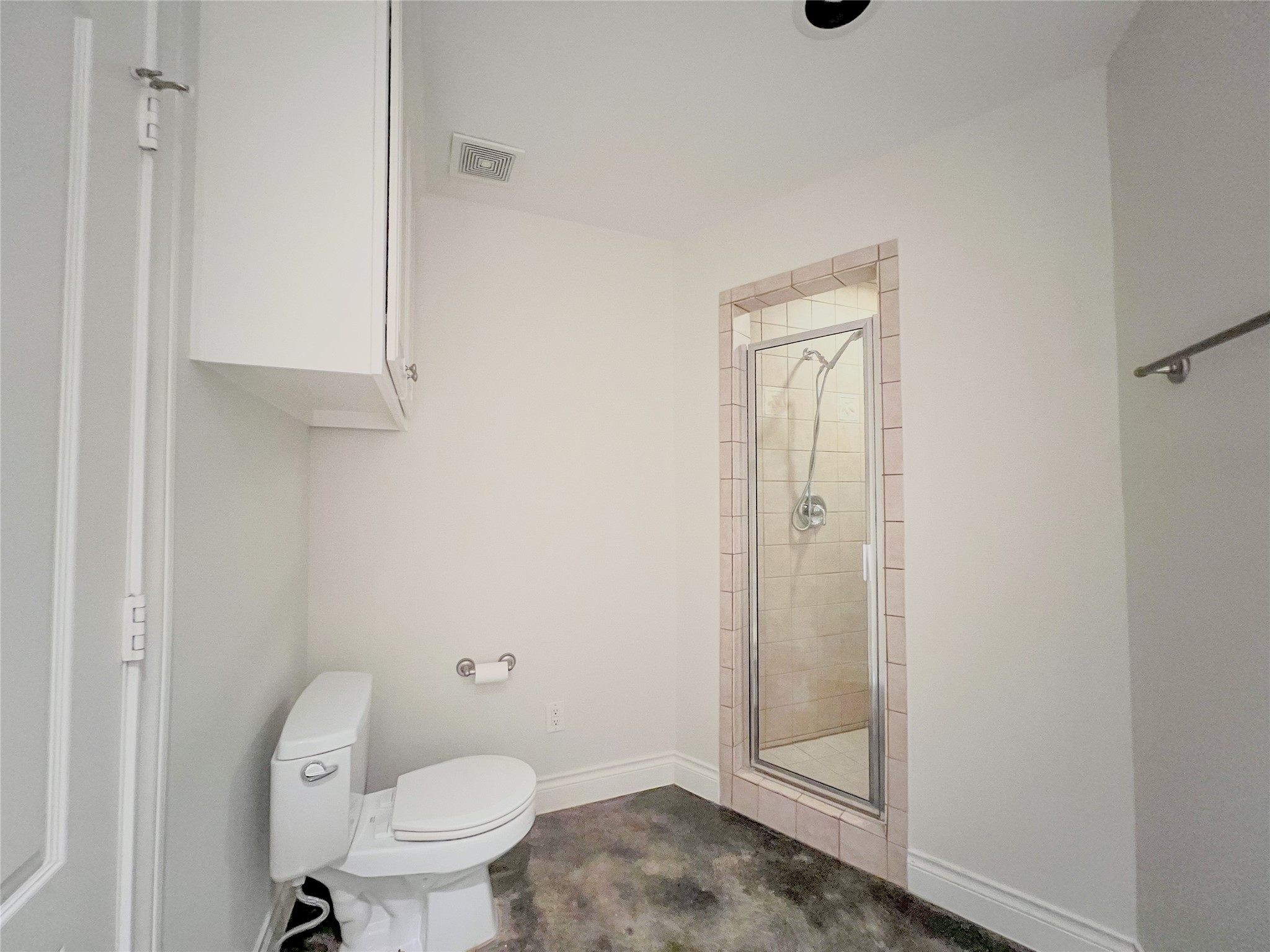 2201 Austin Street Houston, TX 77002 - Photo 17 of 25 a bathroom with a granite countertop toilet and a sink