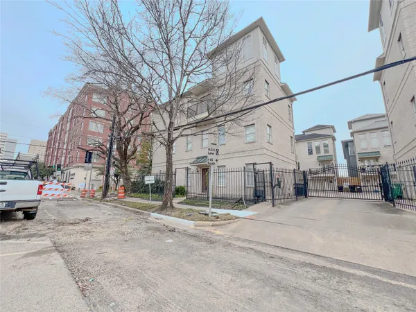 a view of a street with cars