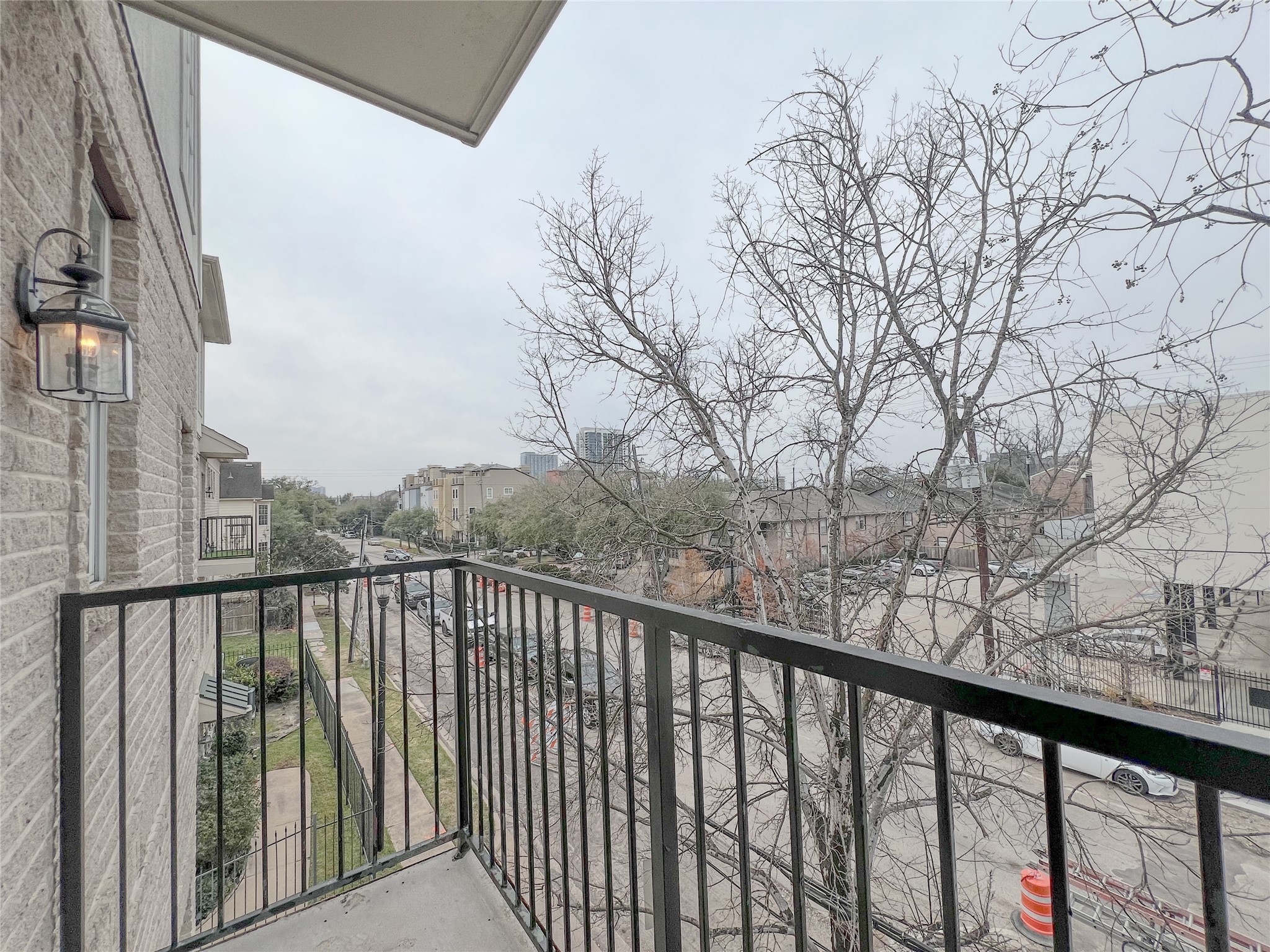 2201 Austin Street Houston, TX 77002 - Photo 3 of 25 a view of a balcony with a pot