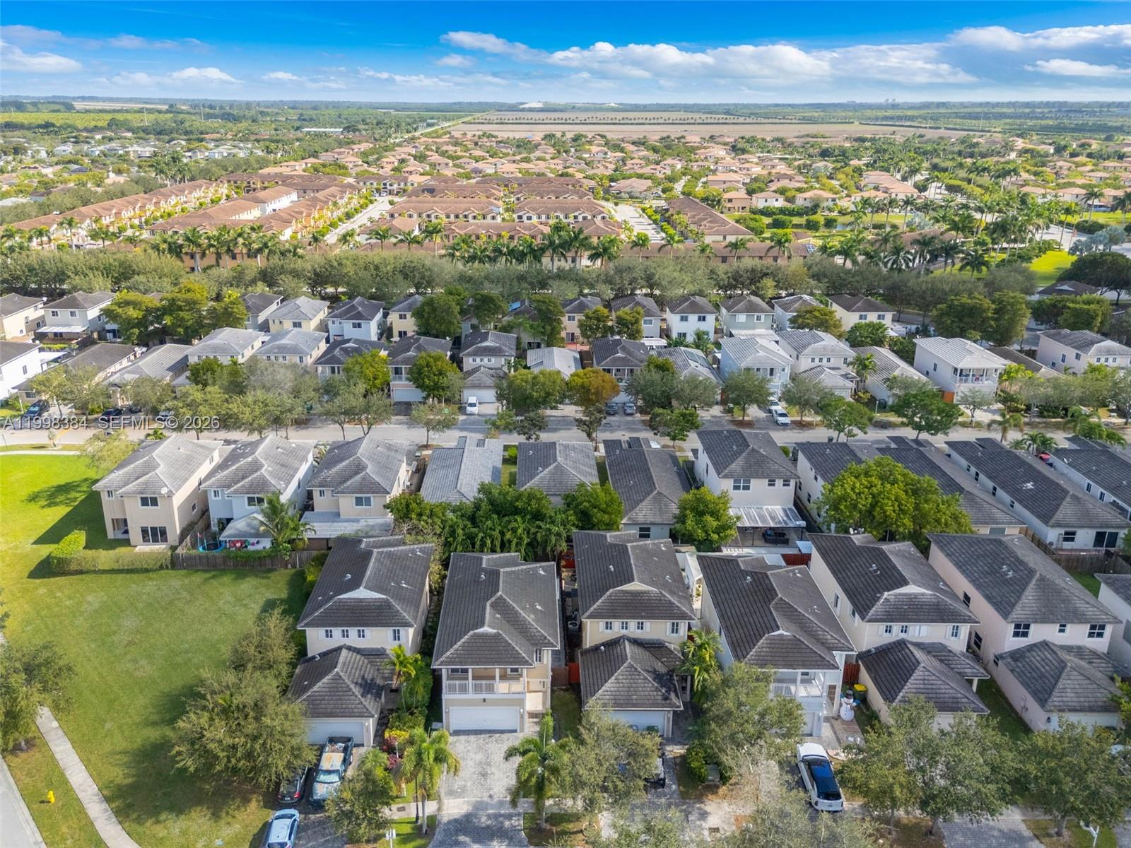 239 Southeast 31st Terrace Homestead, FL 33033 - Photo 4 of 49 an aerial view of residential houses with outdoor space and ocean
