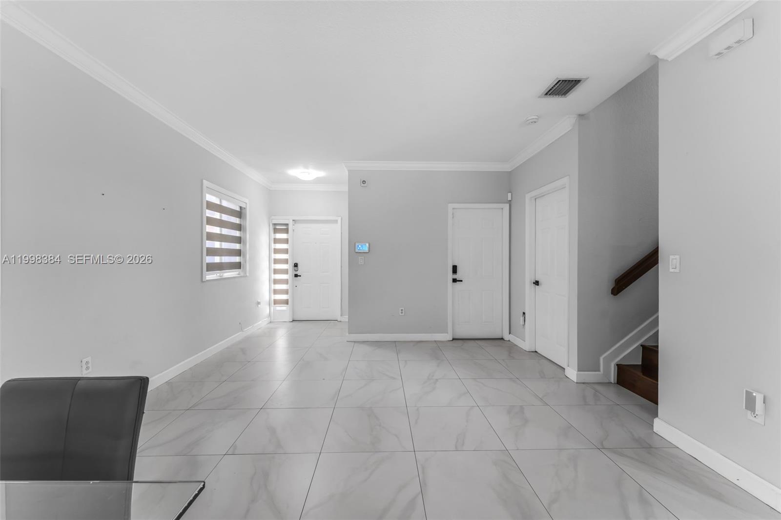 239 Southeast 31st Terrace Homestead, FL 33033 - Photo 42 of 49 a view of an empty room with a window