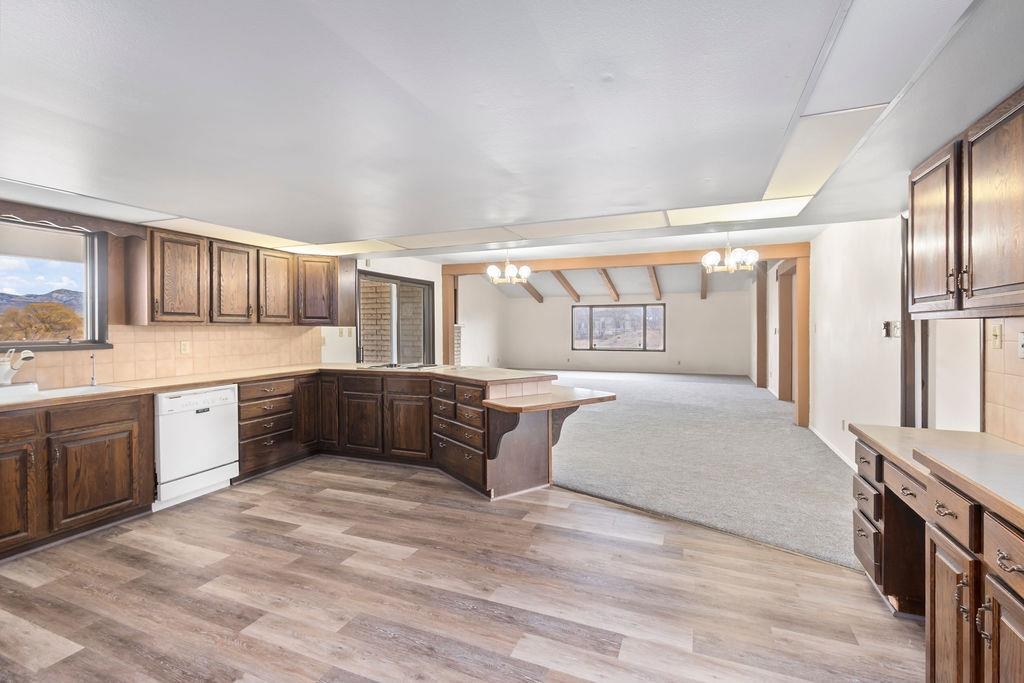 2590 I Road Grand Junction, CO 81505 - Photo 11 of 41 a large bedroom with a large bed and a dresser