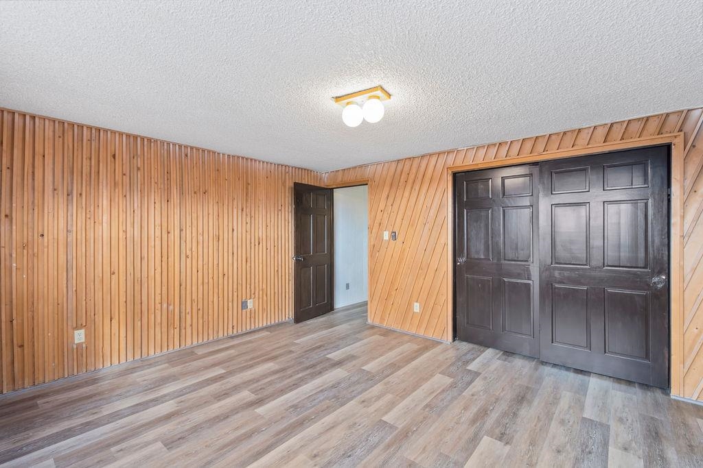 2590 I Road Grand Junction, CO 81505 - Photo 19 of 41 an empty room with wooden floor and closet area