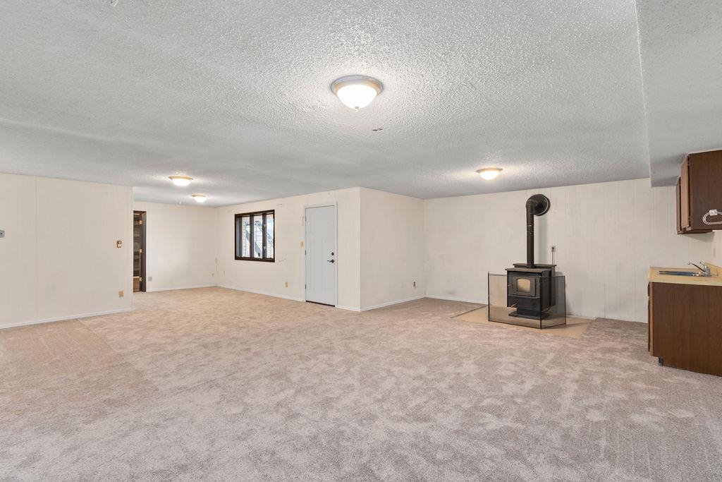 2590 I Road Grand Junction, CO 81505 - Photo 21 of 41 a view of a livingroom with a fireplace