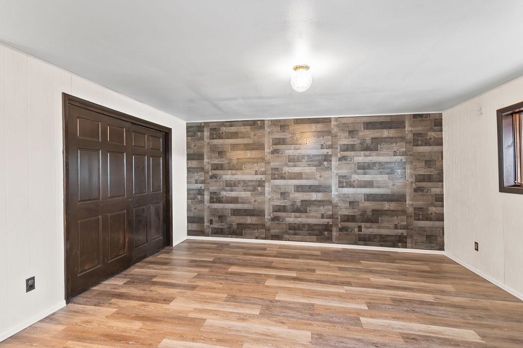 2590 I Road Grand Junction, CO 81505 - Photo 24 of 41 a view of wooden floor and brick walls