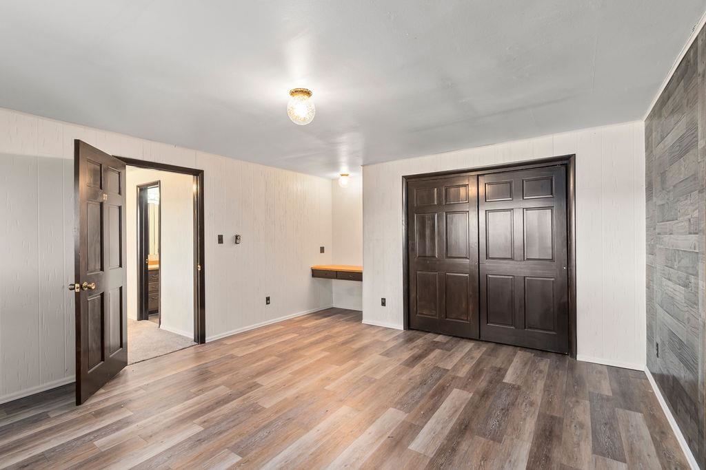 2590 I Road Grand Junction, CO 81505 - Photo 25 of 41 wooden floor and closet in a room