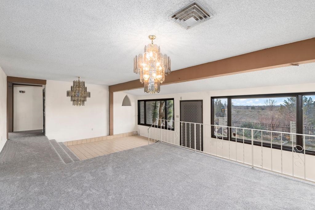2590 I Road Grand Junction, CO 81505 - Photo 3 of 41 wooden floor in an empty room with a window