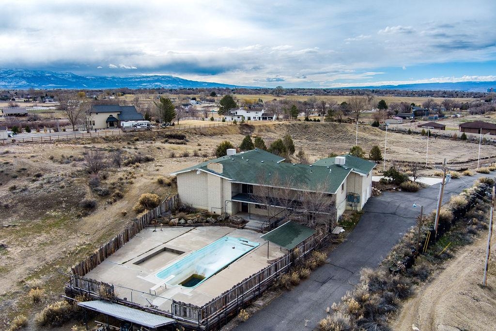 2590 I Road Grand Junction, CO 81505 - Photo 36 of 41 an aerial view of a house with a yard