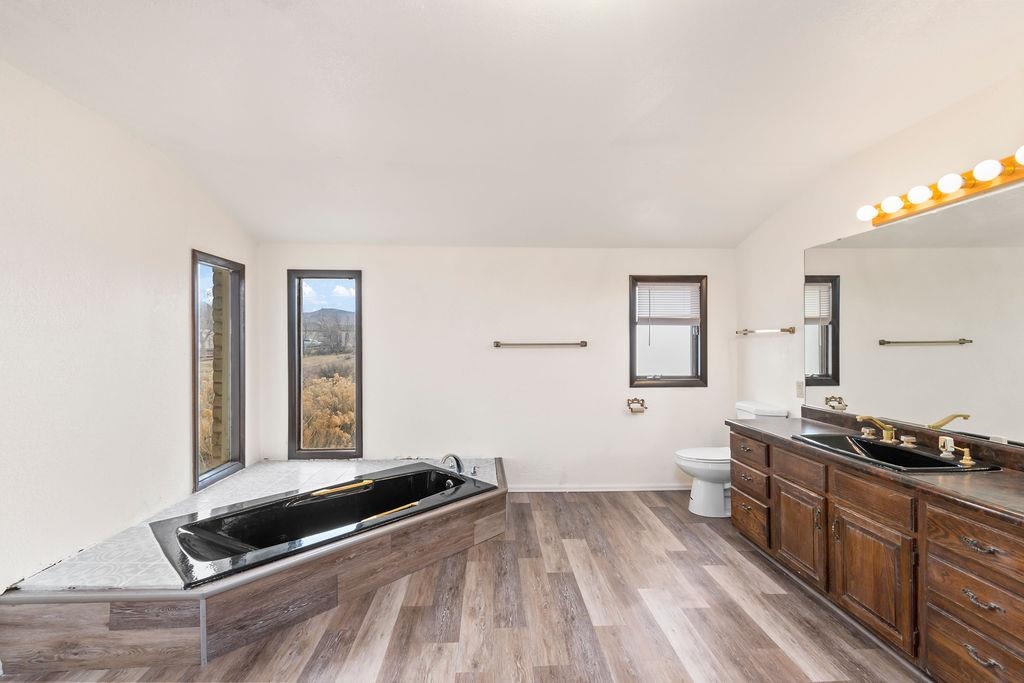 2590 I Road Grand Junction, CO 81505 - Photo 6 of 41 a living room with a bed furniture and a window