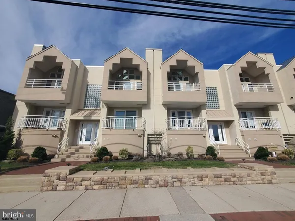 a front view of multiple houses