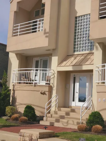 a front view of a house with yard