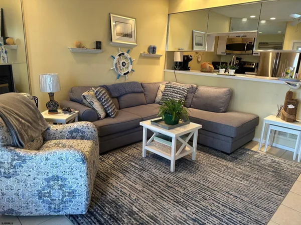a living room with furniture and a couch