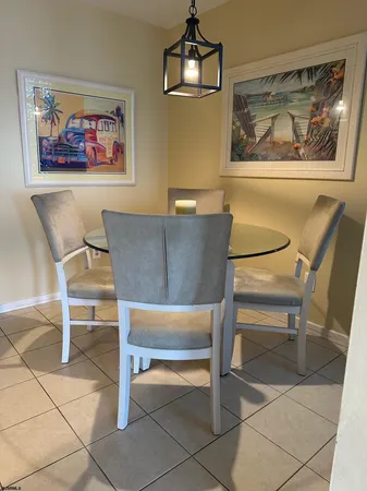 a view of a livingroom with furniture and piano table