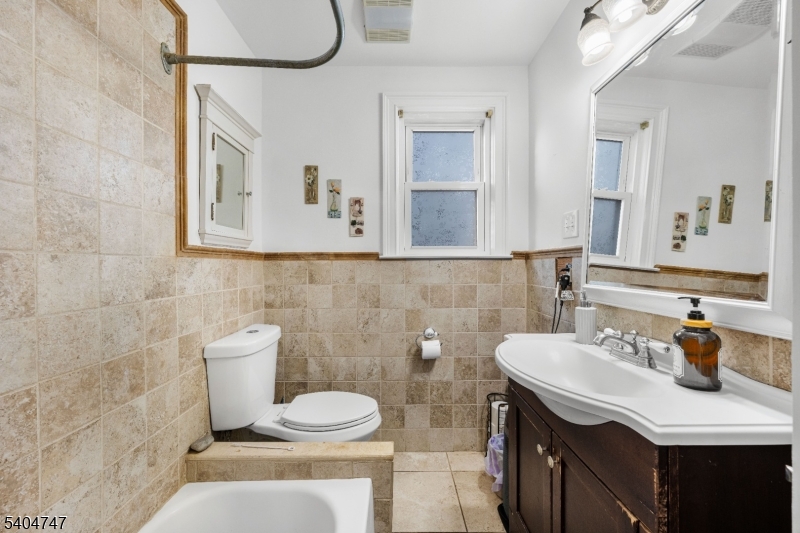 45 Dreahook Road Somerville, NJ 08876 - Photo 11 of 26 a bathroom with a sink toilet and mirror