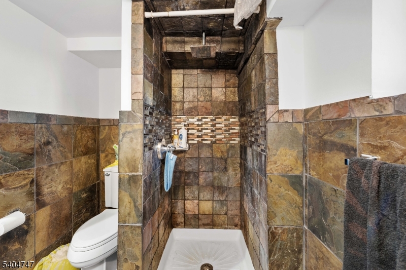 45 Dreahook Road Somerville, NJ 08876 - Photo 14 of 26 a bathroom with a toilet and shower