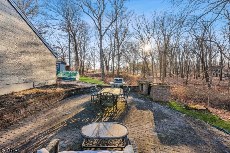 45 Dreahook Road Somerville, NJ 08876 - Photo 17 of 26 a view of a backyard with sitting area