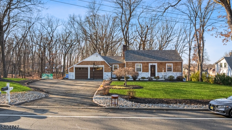 45 Dreahook Road Somerville, NJ 08876 - Photo 18 of 26 a front view of a house with a garden