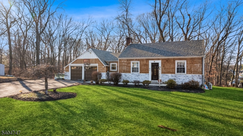 45 Dreahook Road Somerville, NJ 08876 - Photo 19 of 26 a front view of a house with a yard and trees