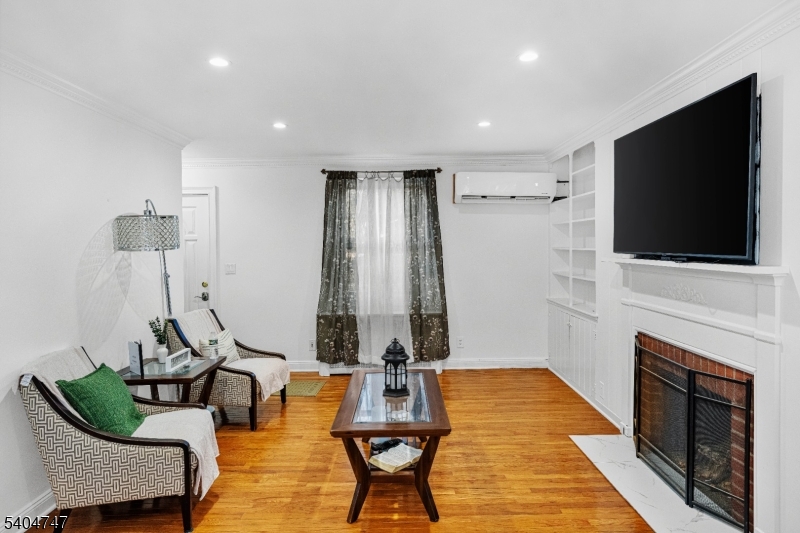 45 Dreahook Road Somerville, NJ 08876 - Photo 4 of 26 a living room with furniture and a flat screen tv