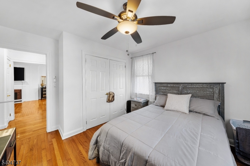 45 Dreahook Road Somerville, NJ 08876 - Photo 10 of 26 a bedroom with a bed and a chandelier