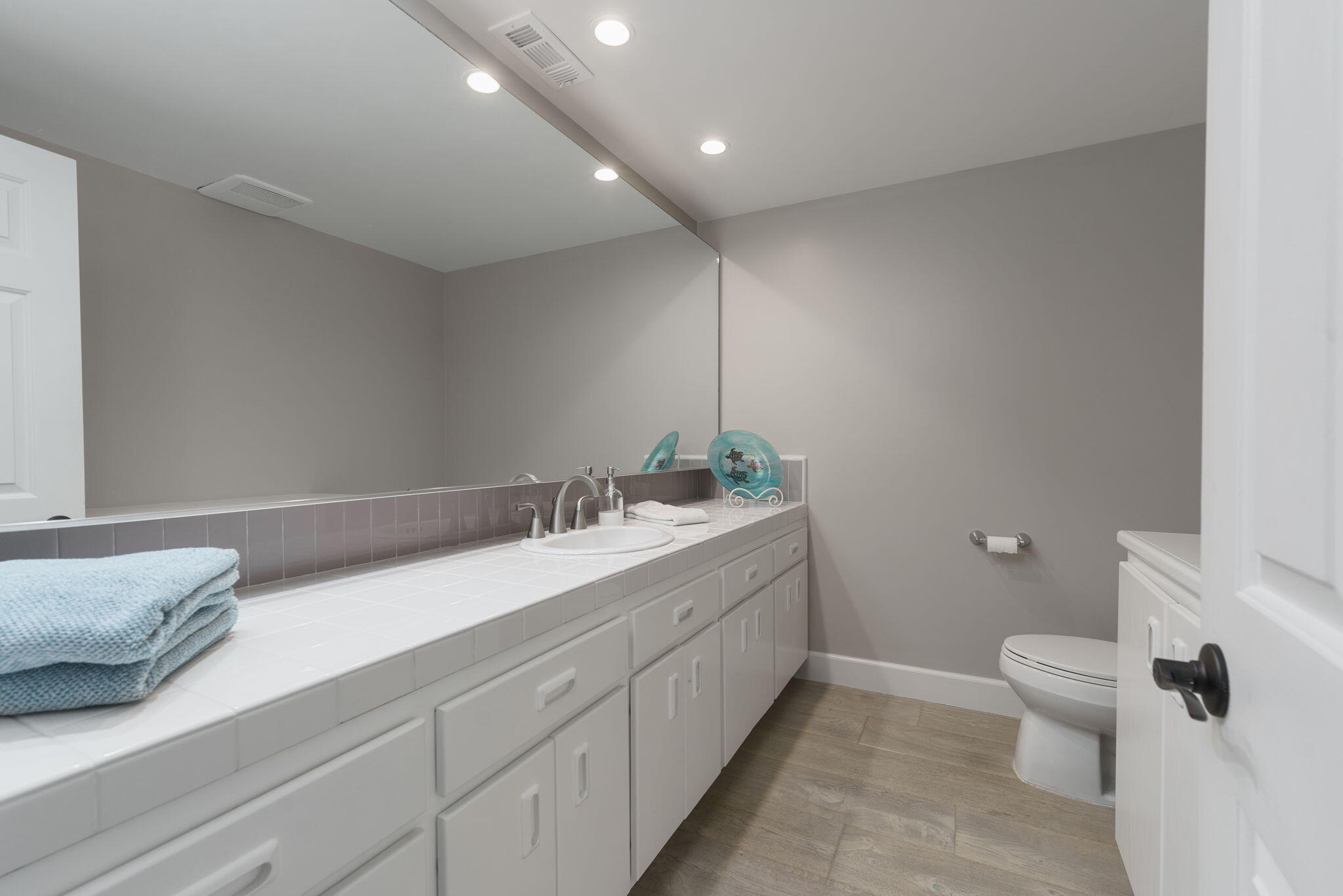5235 Sealane Way Oxnard, CA 93035 - Photo 15 of 53 a bathroom with a sink and a toilet