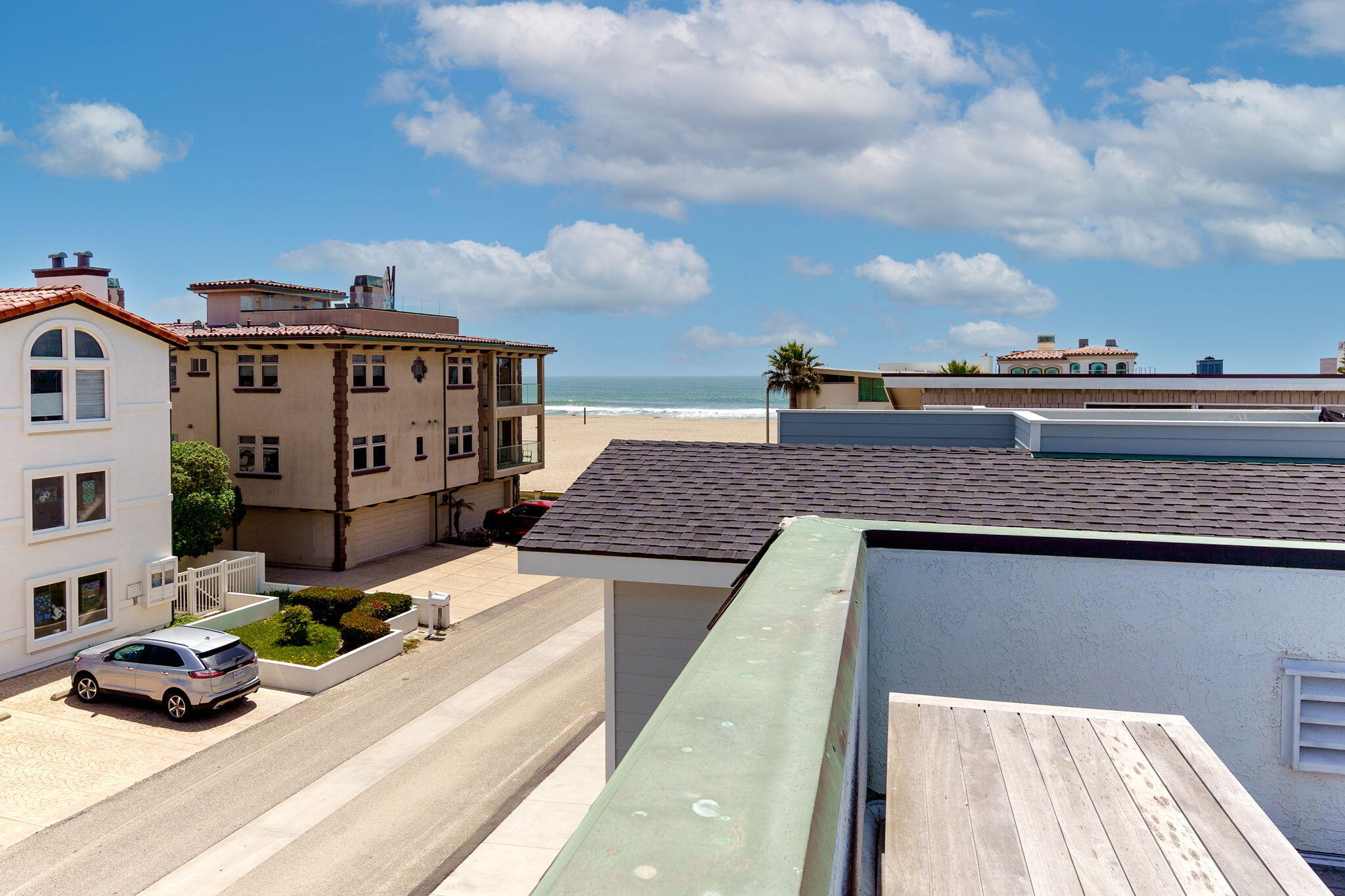 5235 Sealane Way Oxnard, CA 93035 - Photo 28 of 53 a view of balcony with two chairs and wooden floor