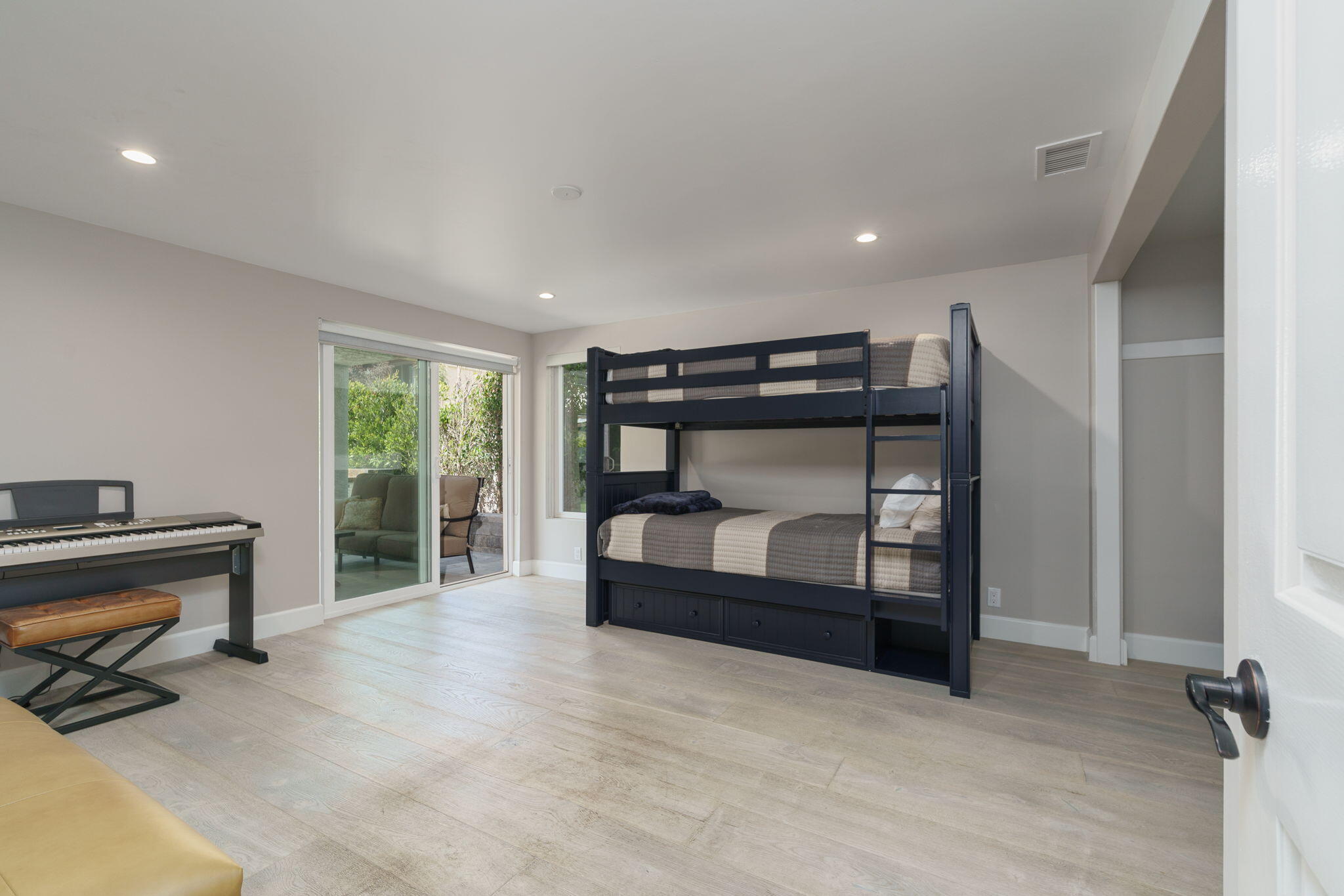 5235 Sealane Way Oxnard, CA 93035 - Photo 33 of 53 a bedroom with furniture and a fireplace