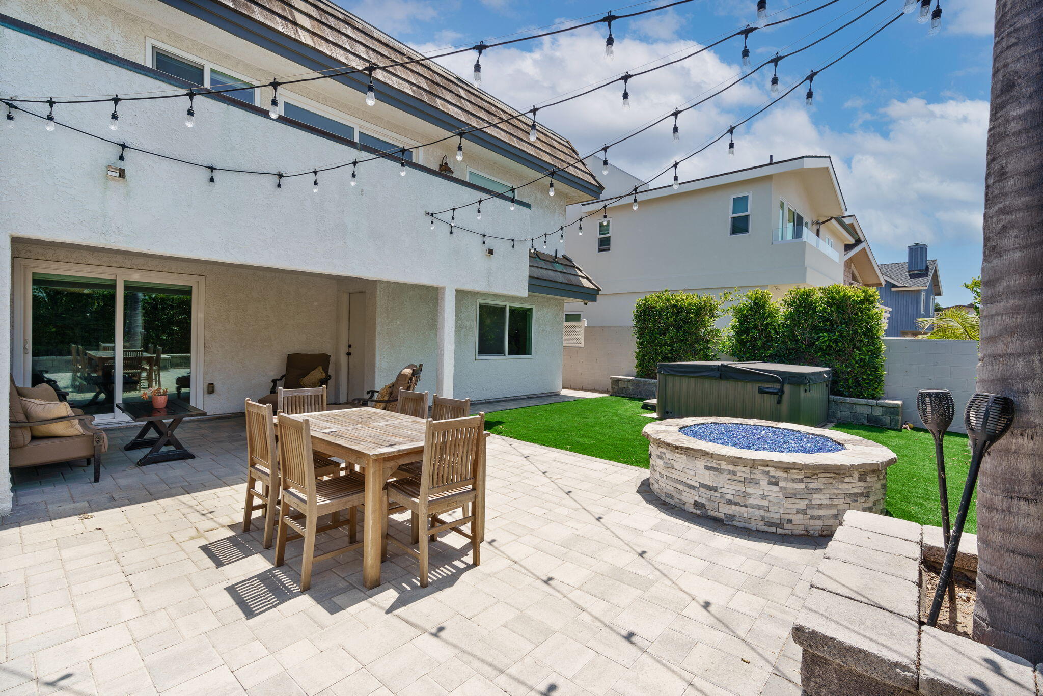 5235 Sealane Way Oxnard, CA 93035 - Photo 36 of 53 a view of a patio with a dining table and chairs