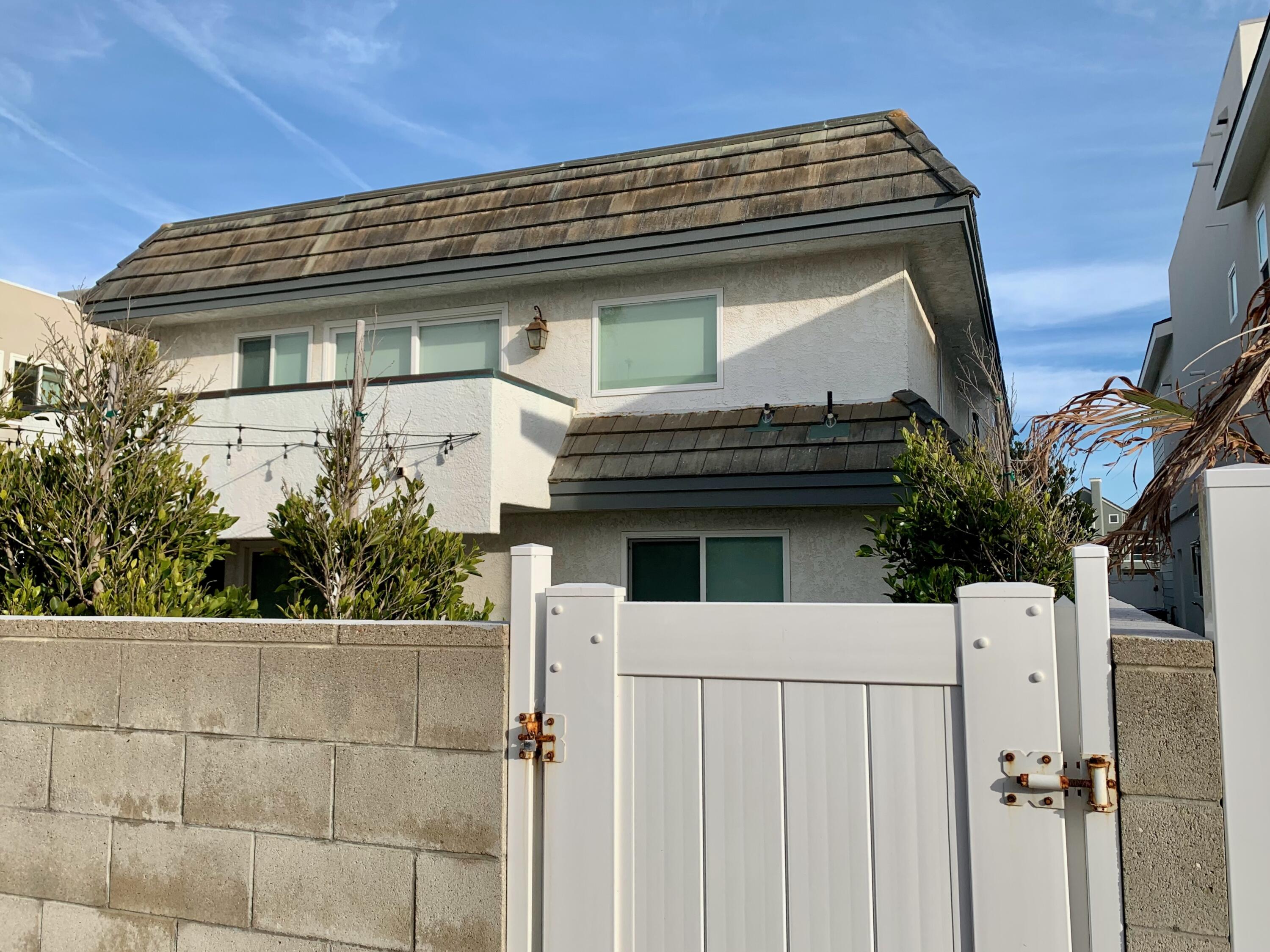 5235 Sealane Way Oxnard, CA 93035 - Photo 44 of 53 a view of house with a window and potted plants