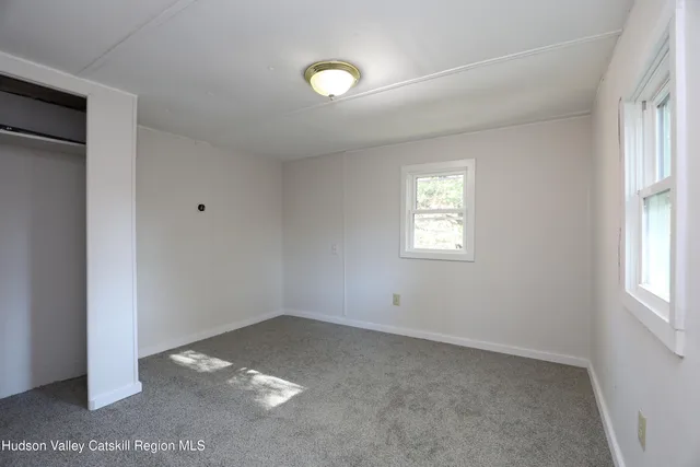 a view of a window in an empty room