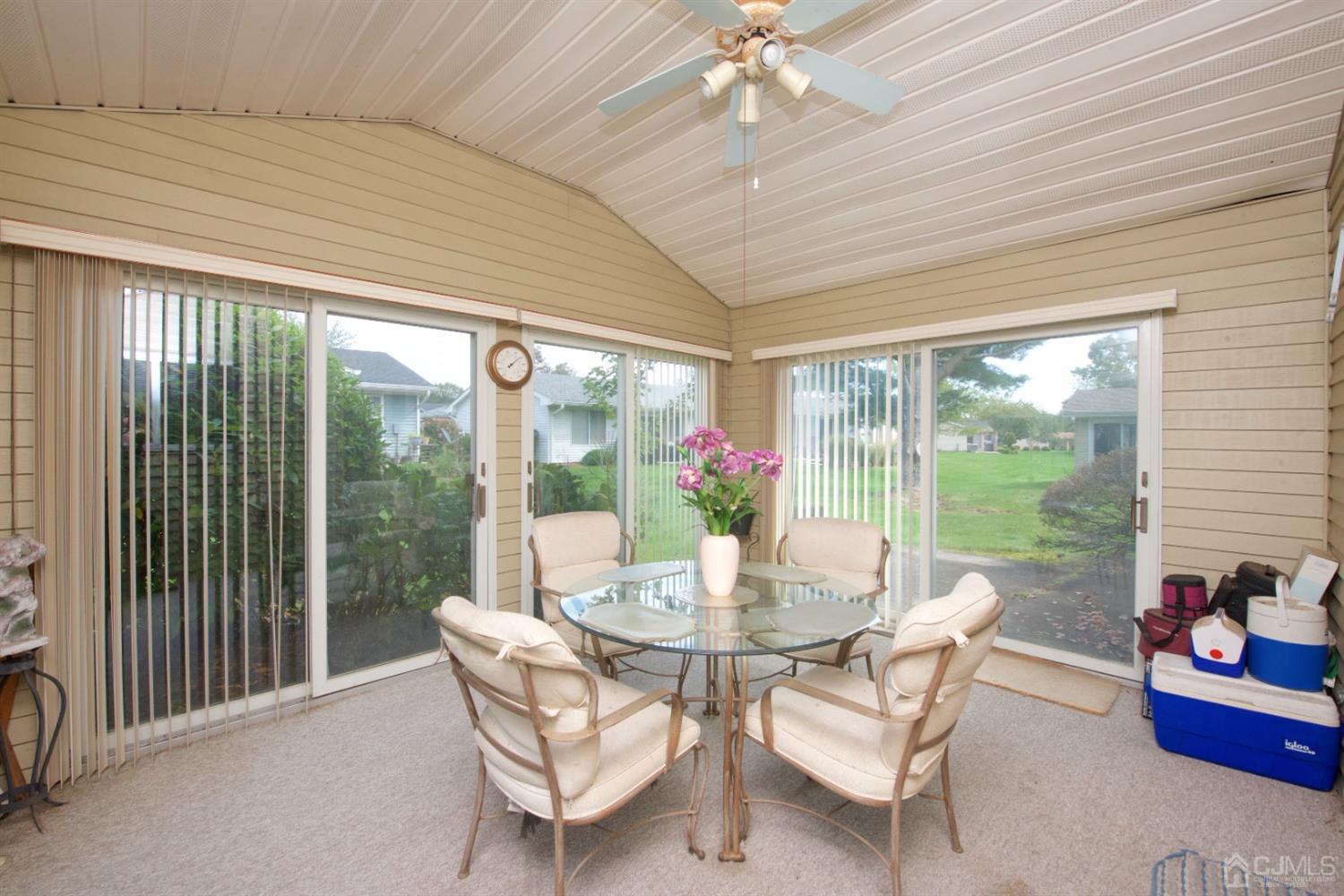A Pompton Road Monroe Township, NJ 08831 - Photo 13 of 30 a dining room with furniture garden view and a potted plant
