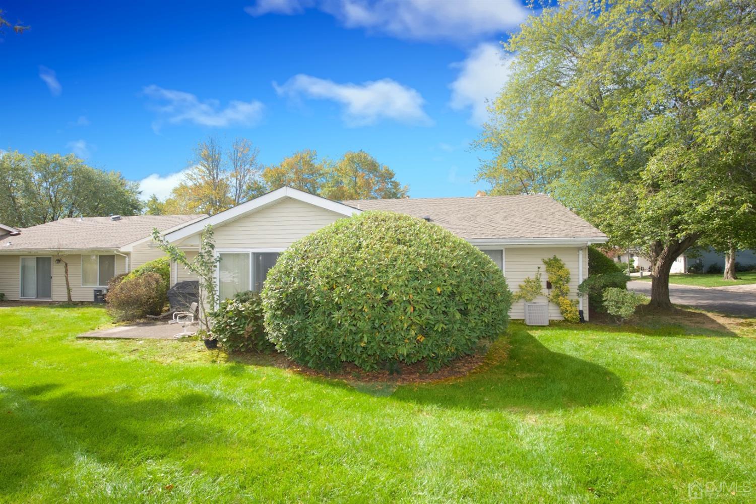A Pompton Road Monroe Township, NJ 08831 - Photo 23 of 30 a view of a house with a yard