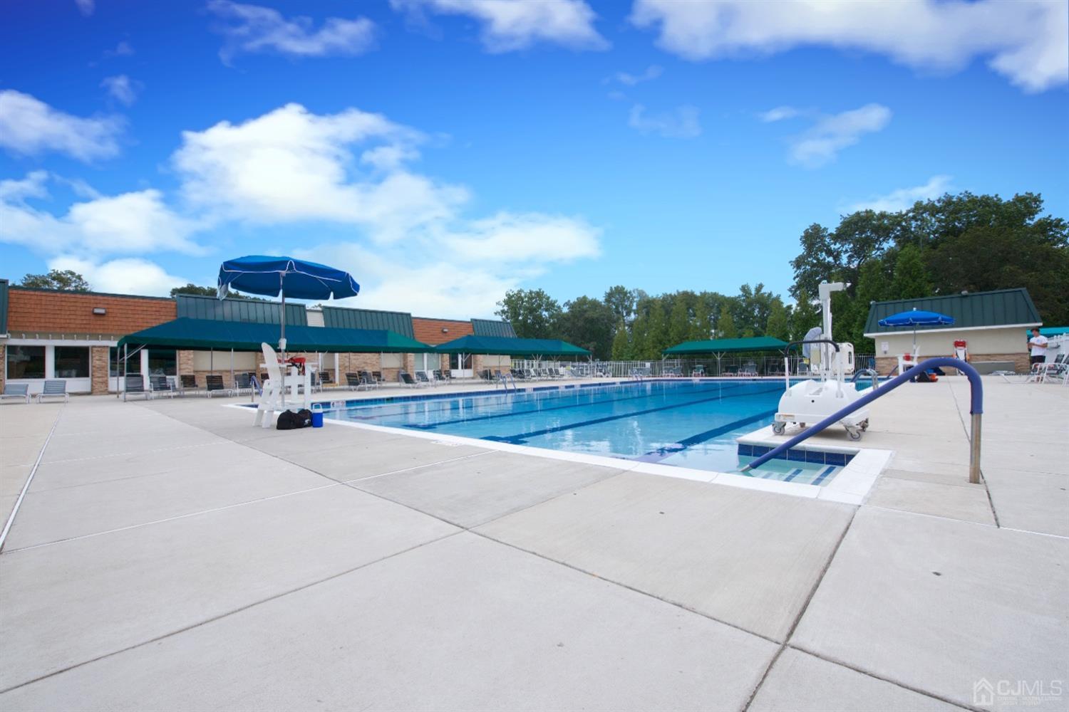 A Pompton Road Monroe Township, NJ 08831 - Photo 29 of 30 a view of a swimming pool with sitting area and furniture