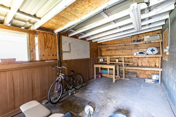 a view of a room with wooden walls