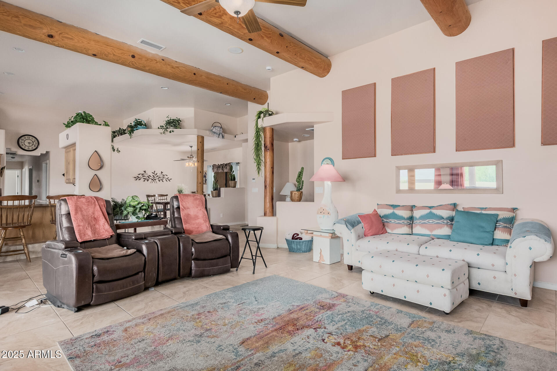 1025 North Boyd Road Apache Junction, AZ 85119 - Photo 11 of 60 a living room with furniture and a couch