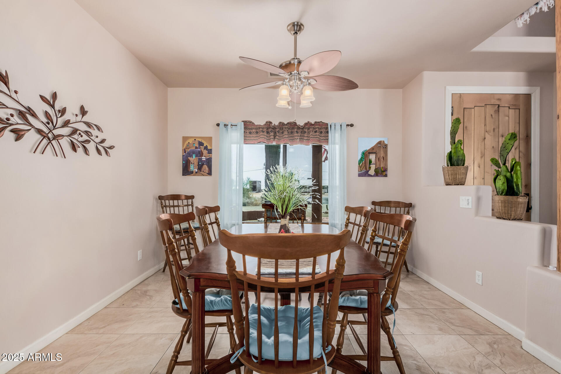 1025 North Boyd Road Apache Junction, AZ 85119 - Photo 13 of 60 a view of a dining room with furniture and chandelier