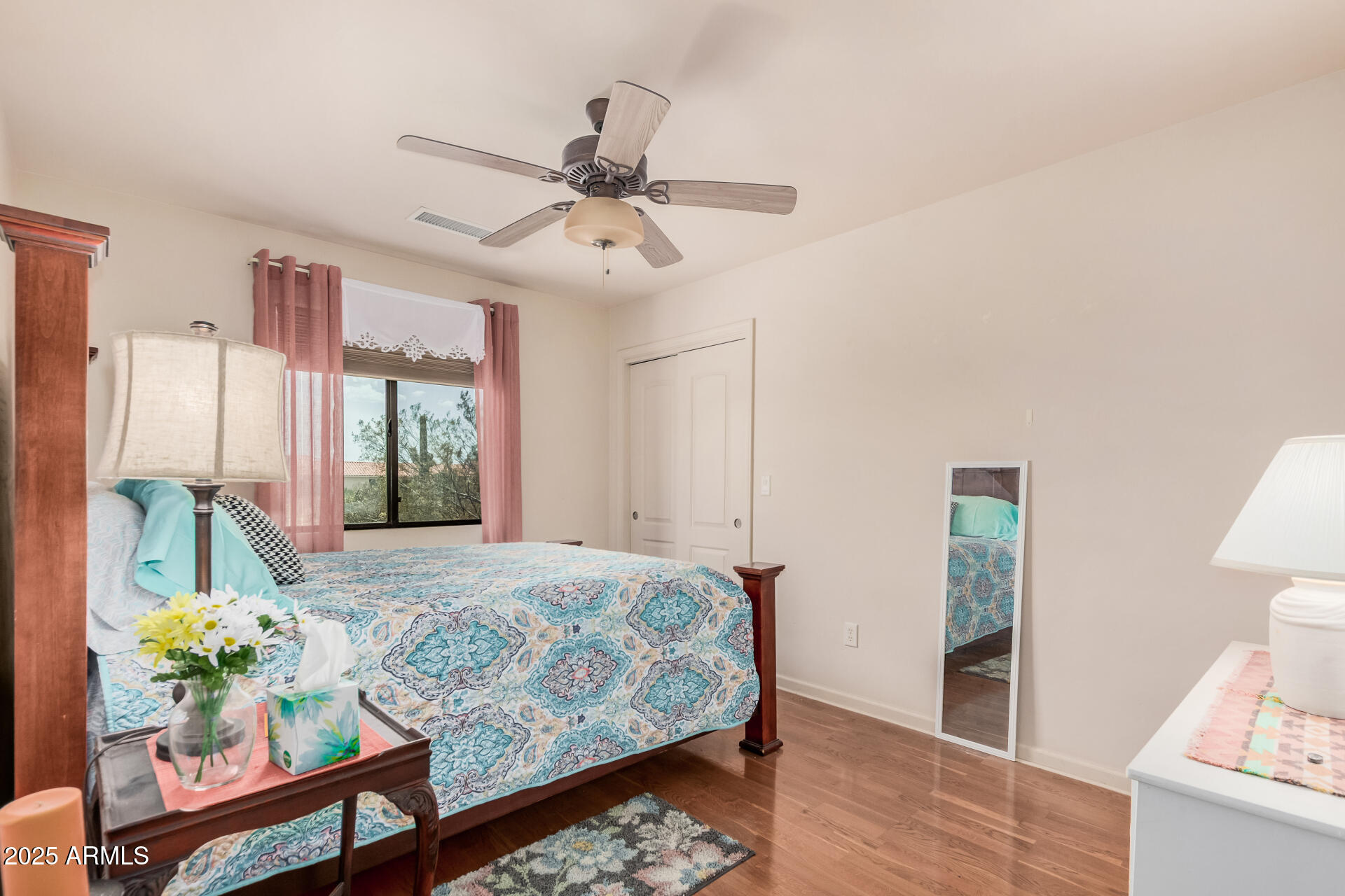 1025 North Boyd Road Apache Junction, AZ 85119 - Photo 26 of 60 a bedroom with furniture and a window