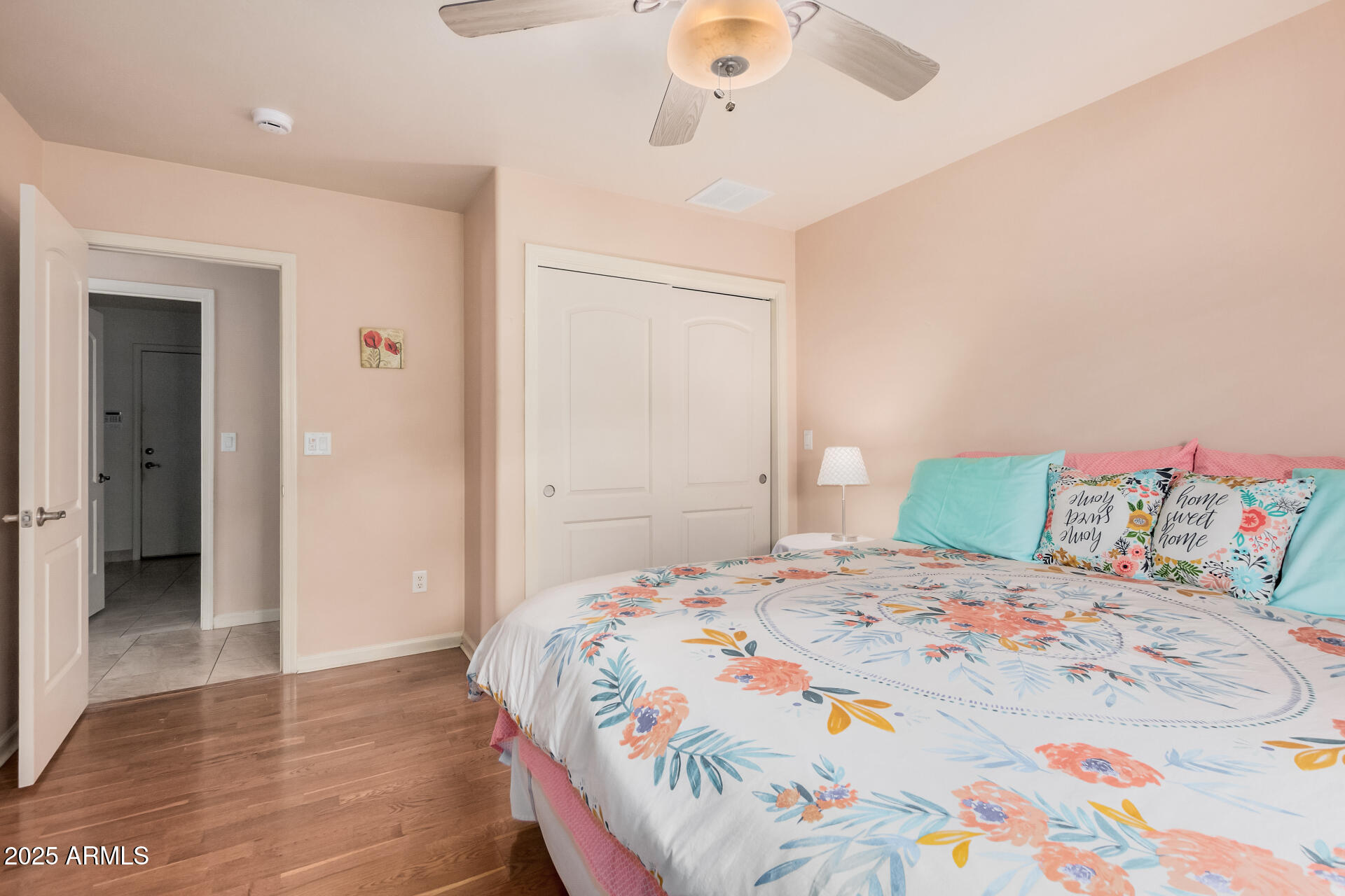 1025 North Boyd Road Apache Junction, AZ 85119 - Photo 28 of 60 a bedroom with a bed and a walk in closet