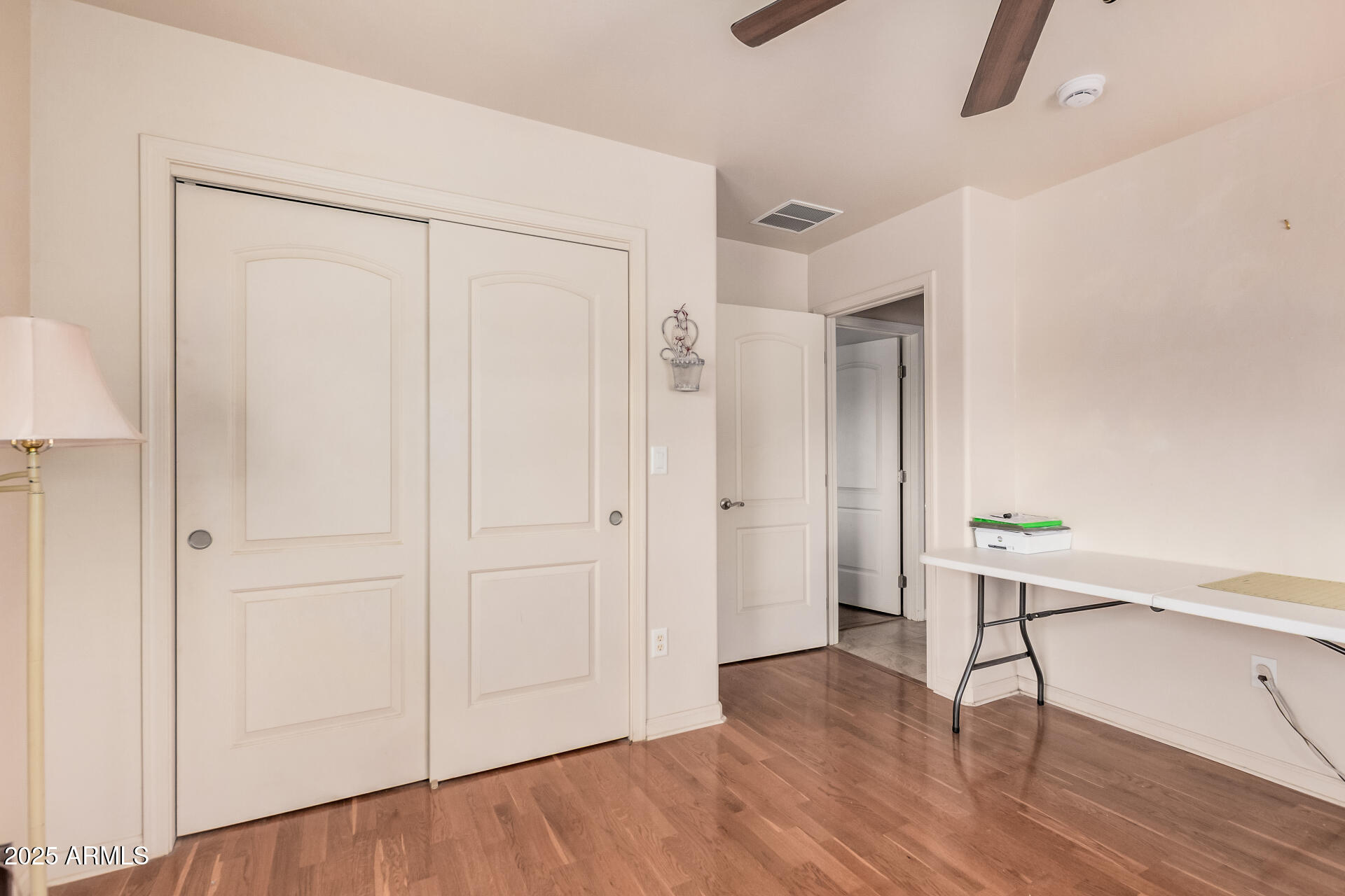 1025 North Boyd Road Apache Junction, AZ 85119 - Photo 31 of 60 a view of empty room with wooden floor